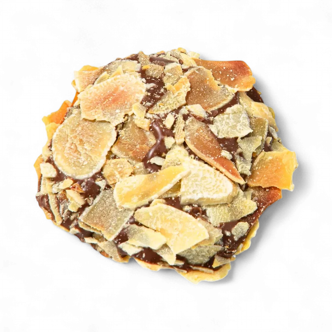  Artisan chocolate truffle covered with almond flakes.