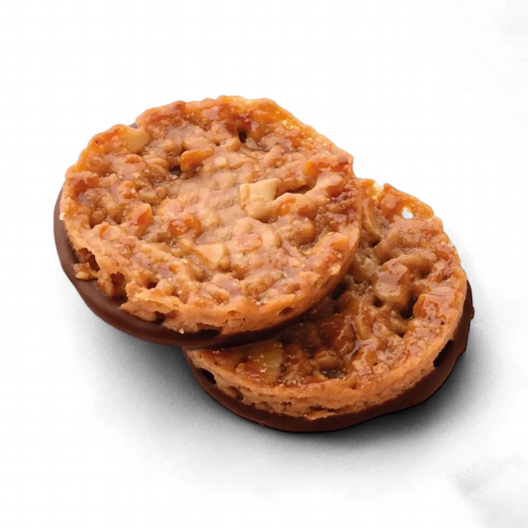  Pistachio, orange, and almond crisp on a dark chocolate base.