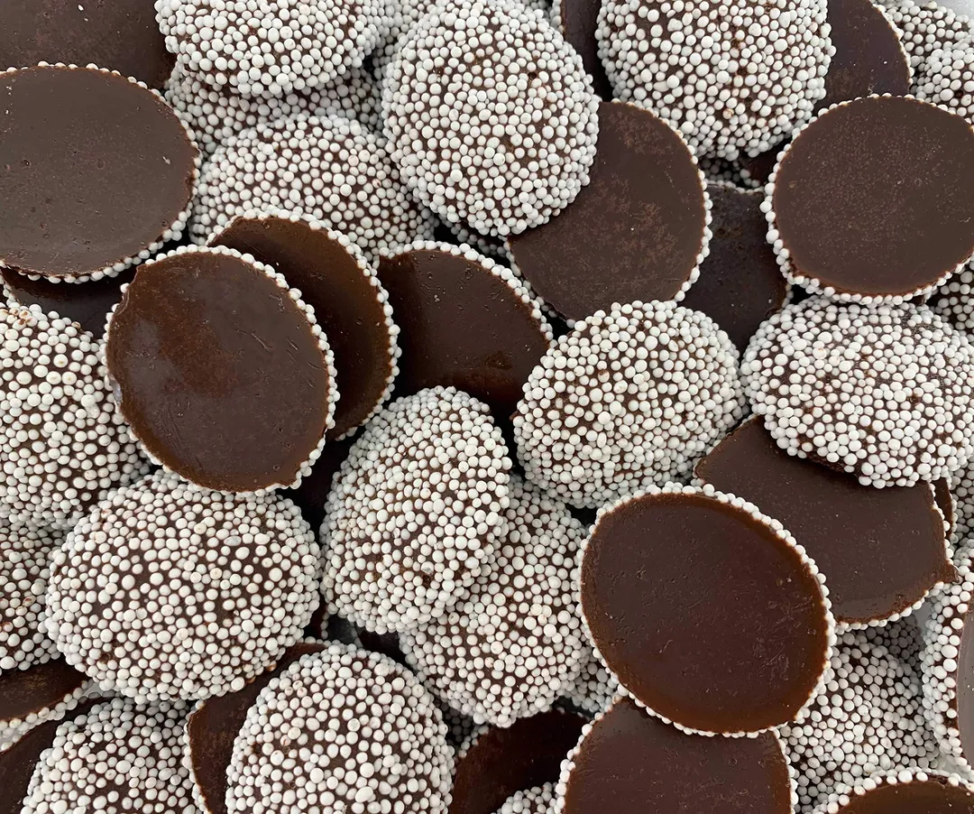 Dark Chocolate Nonpareils White Seed 25 Pound Sealed Case